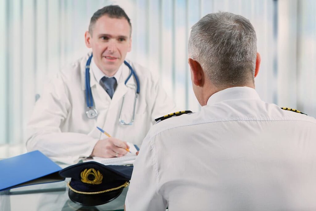 Pilot and doctor sitting at table